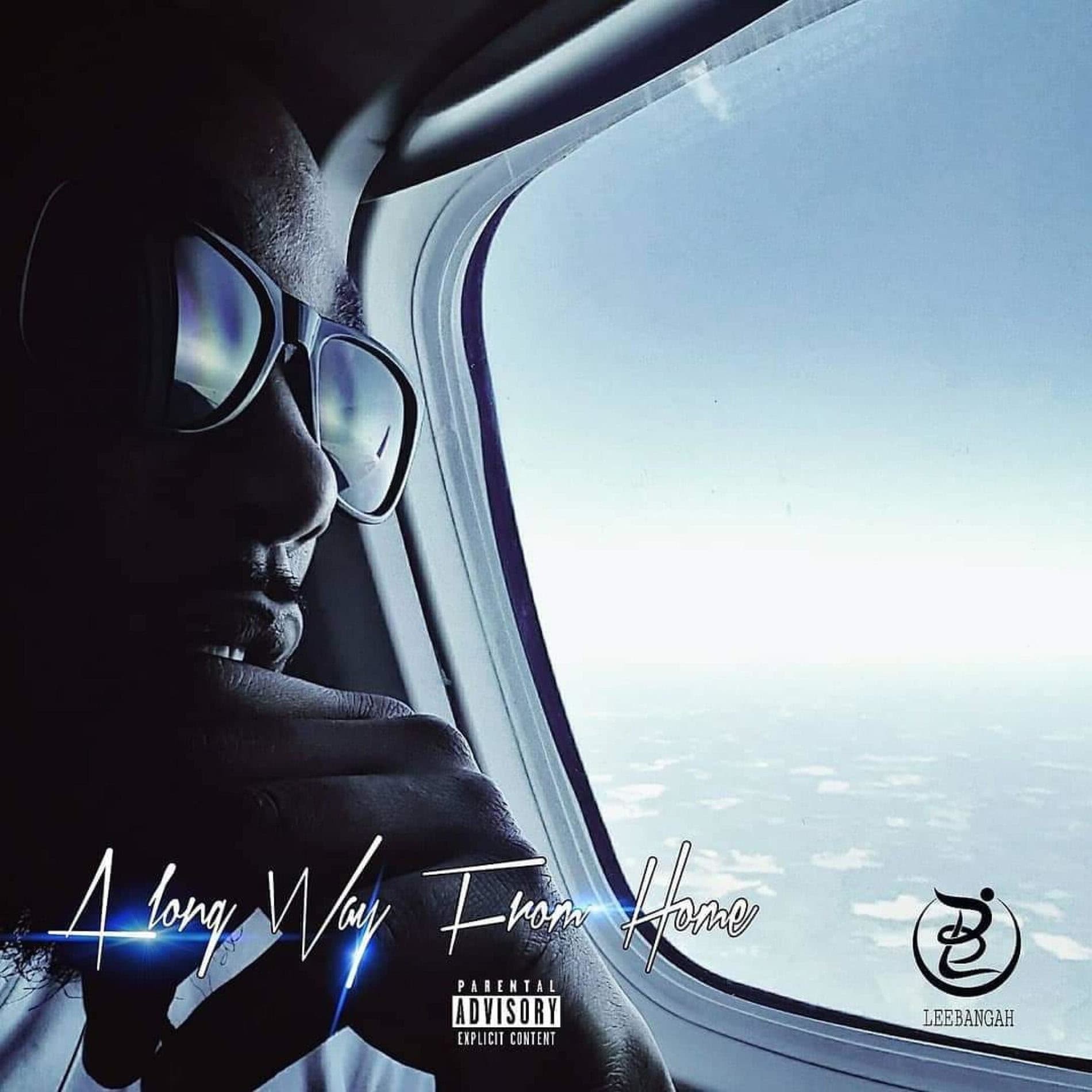Man in sunglasses gazes out an airplane window on the "A Long Way From Home" album cover.